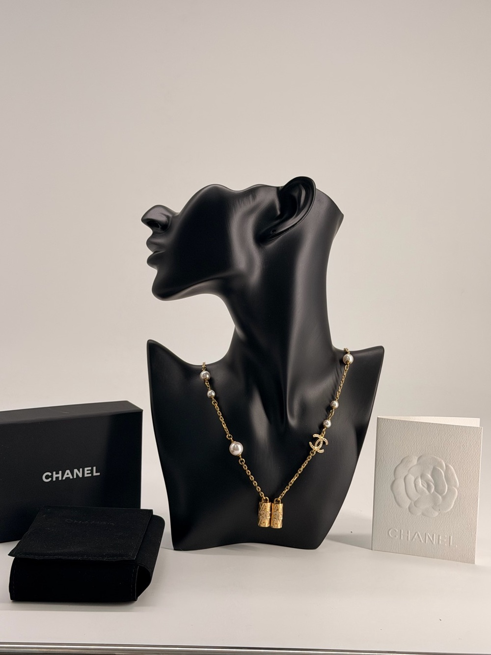 CHANEL Metal Crystal Pearl Airpod Necklace Gold